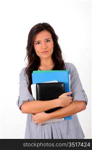 Student holding pile of files