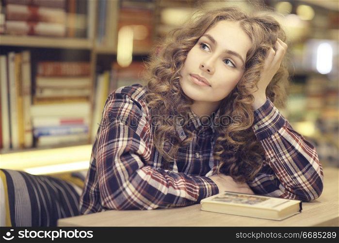 student in a library portrait
