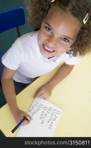 Student in class learning spelling (selective focus)