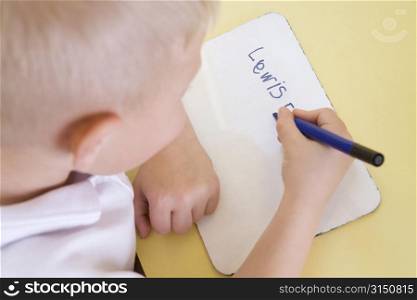Student in class learning spelling (selective focus)