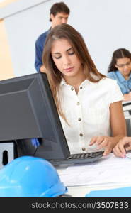 Student in class working on computer