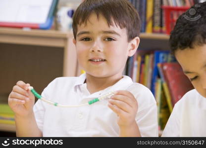 Student in math class with counting beads