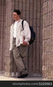 Student Leaning Against Column