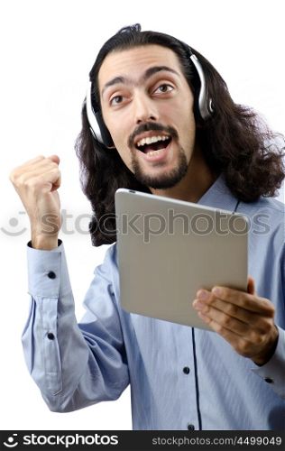 Student listening music with tablet computer