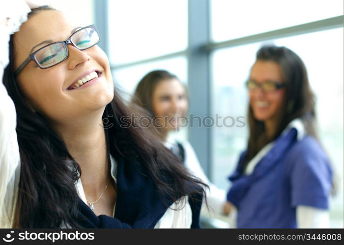 Student meeting smiley girl face on foreground