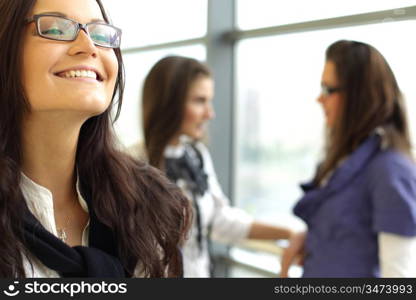 Student meeting smiley girl face on foreground