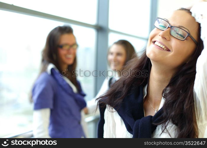 Student meeting smiley girl face on foreground