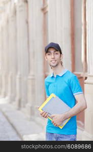 Student outside preparing for exams