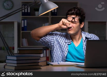 Student preparing for exams late night at home