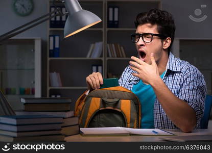 Student preparing for exams late night at home