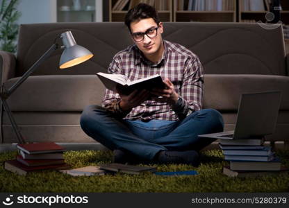 Student reading books preparing for exams