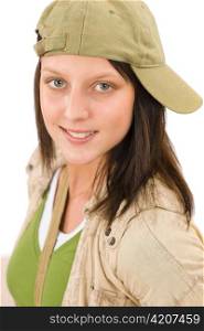 Student teenager girl with baseball cap posing looking at camera