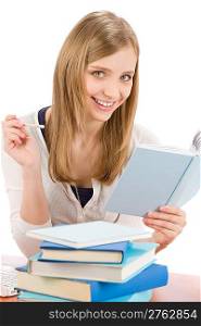 Student teenager happy woman write homework with book