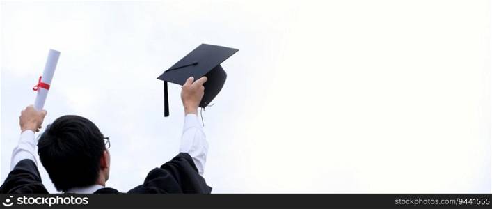 Student with congratulations, graduates wearing a graduation gown of university 