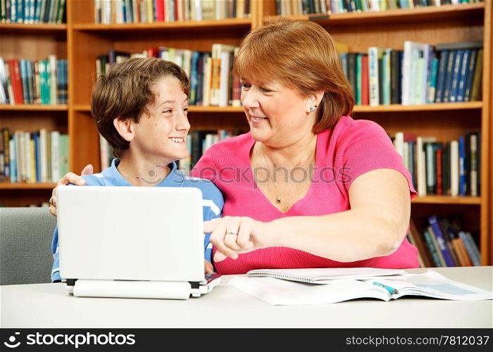 Student with learning disabilities gets one-on-one attention from a teacher.