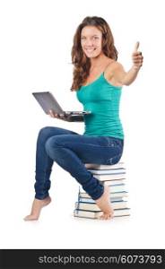 Student with netbook sitting on books