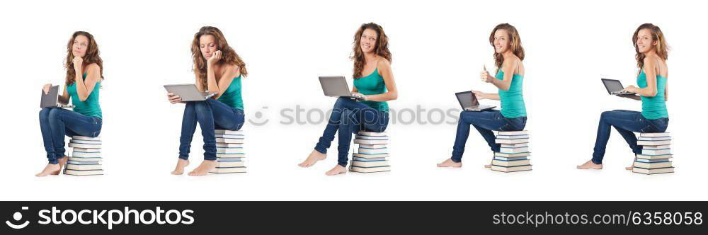 Student with netbook sitting on books