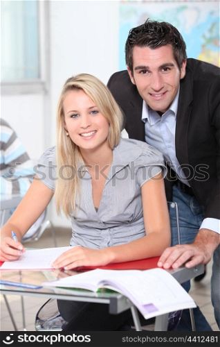 student with teacher
