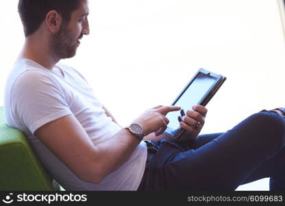 student working on tablet computer at university school modern interior