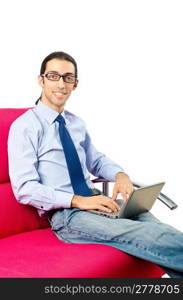 Student working with laptop sitting on sofa