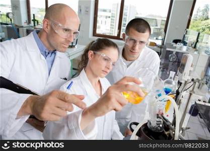 students and teacher in biology training course