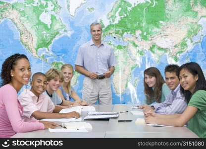 Students answering questions in geography class