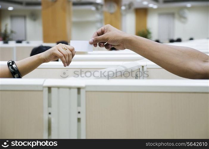 Students exchanging a note