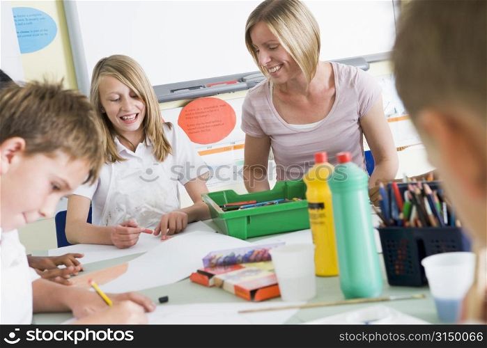 Students in art class with teacher