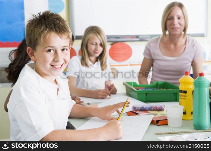 Students in art class with teacher (selective focus)