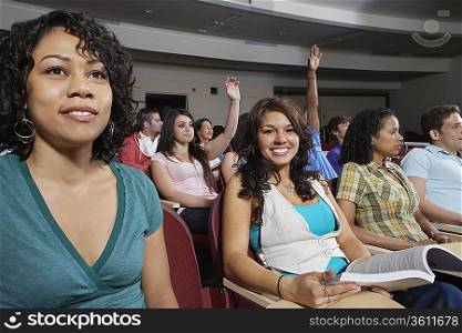 Students sitting in lecture theatre during lesson
