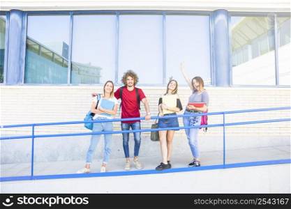 students standing near ramp railing
