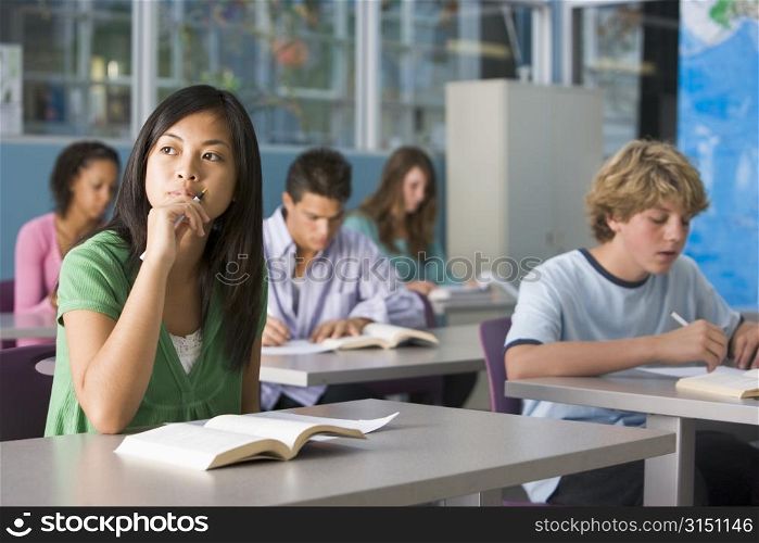 Students studying in geography class