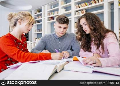 students studying together library