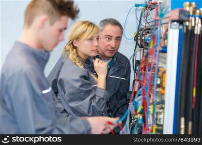 students training on electrical board