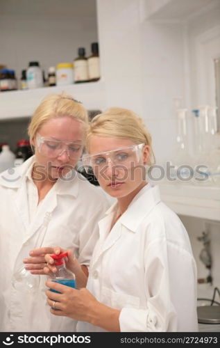 Students working chemistry laboratory