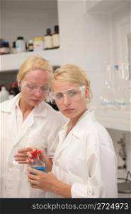 Students working chemistry laboratory