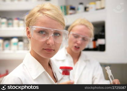Students working chemistry laboratory