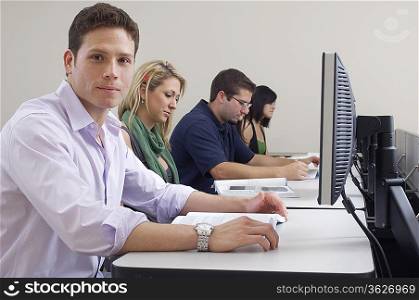 Students working in computer classroom