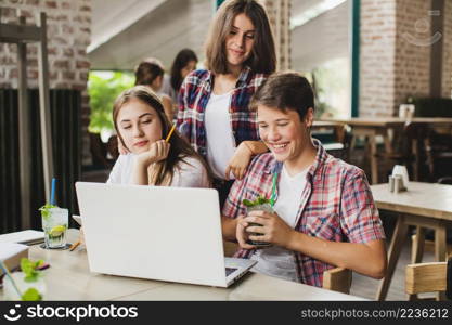 students working laptop together