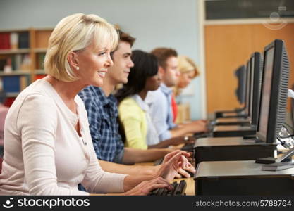 Students working on computers in library