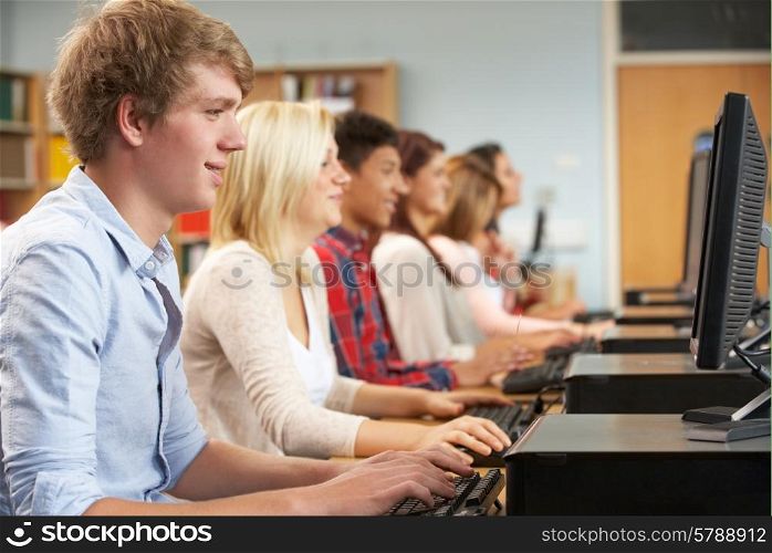Students working on computers in library