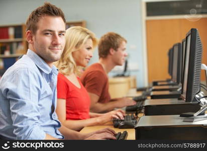 Students working on computers in library