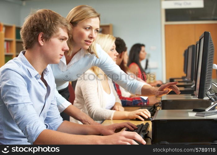 Students working on computers in library