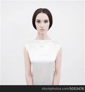 Studio art fashion photo of natural beautiful yong woman on white background. Health and beauty