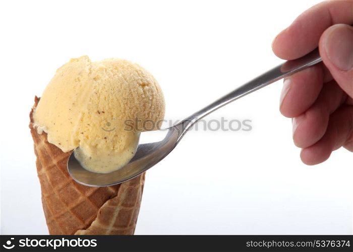 Studio closeup of vanilla ice cream cone