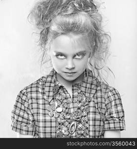 Studio fashion black-white portrait of charming little girl