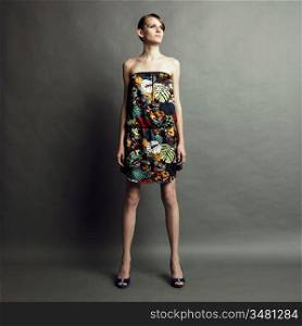 Studio fashion photo elegant girl in dress