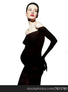 Studio fashion portrait of beautiful pregnant woman. Pretty naked lady.Happy pregnancy. Beauty and health.