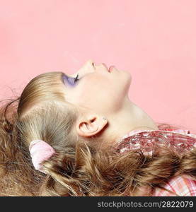 Studio fashion portrait of charming little girl