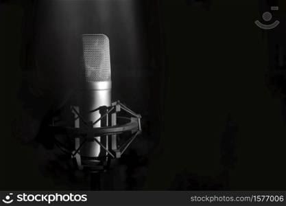 Studio microphone for singer on a black background.. Studio microphone for singer on a black background
